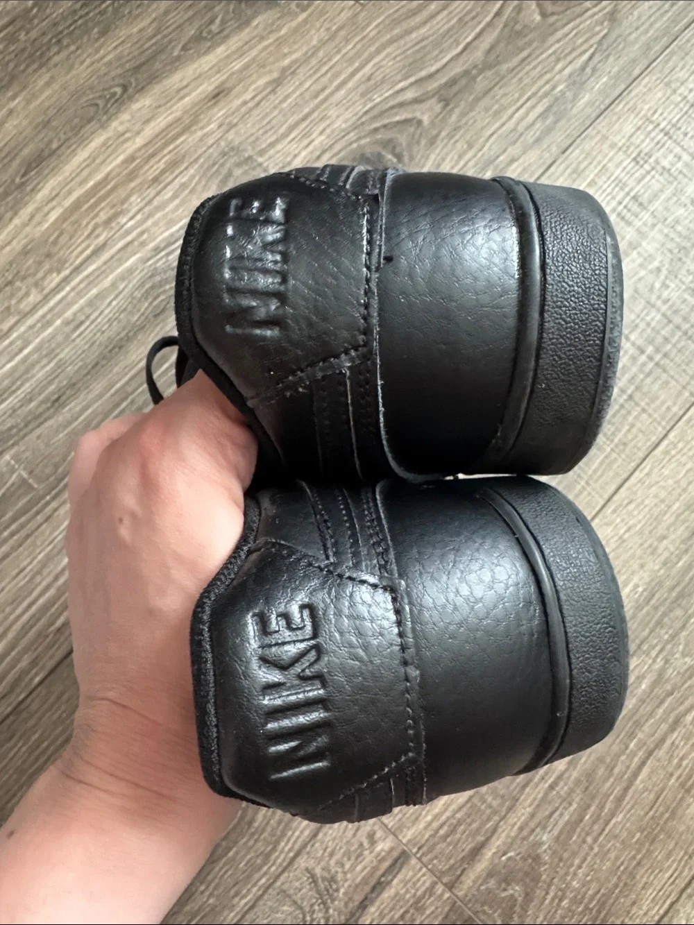 Nike Men’s All-Black Low-Top Leather Sneakers